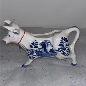Delft Blue  hand painted ceramic cow creamer. Windmill and flower design.